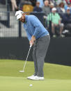 J.B. Holmes of the United States putts on the 17th green during the second round of the British Open Golf Championships at Royal Portrush in Northern Ireland, Friday, July 19, 2019.(AP Photo/Jon Super)