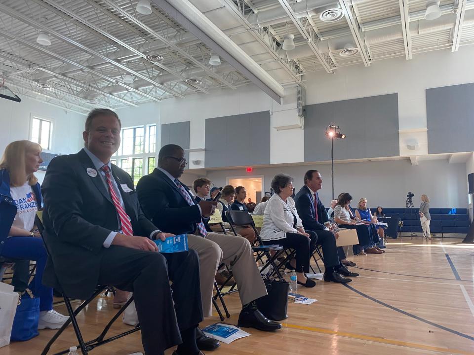 Republican businessman Dan Franzese, far left, and incumbent Democratic U.S. Rep. Lois Frankel, far right, at Tuesday's candidate forum.