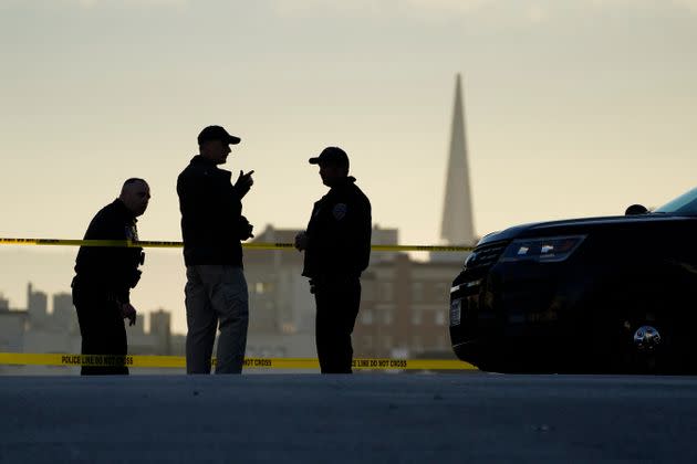 Police stand at the top of the closed street outside the home of House Speaker Nancy Pelosi and her husband, Paul Pelosi, in San Francisco on Friday. Paul Pelosi, was severely beaten by an assailant who broke into their home. (Photo: Eric Risberg/Associated Press)