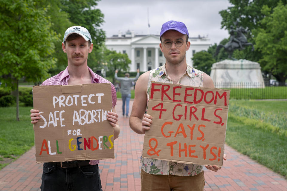 Rob Zajdel, 28, left, and Danny Drees, 27, both of Washington, pose for a portrait as they join abortion rights protesters, Saturday, May 14, 2022, outside the White House in Washington, before marching to the Supreme Court. "Its important for me, identifying as a man, to have that present here. It's important for all of us to come together, it's not just a women's issue. They shouldn't have to be the only ones making noise about this," says Zajdel, "I don't think these rulings will stop at abortion, one of the next things that could be overturned is gay marriage." Adds Drees, "At the heart of this debate is body autonomy. Our right to privacy is on the chopping block." (AP Photo/Jacquelyn Martin)