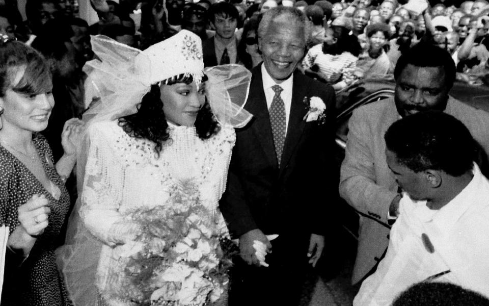 With her father on her wedding day in 1992 - Kevin Carter/AP