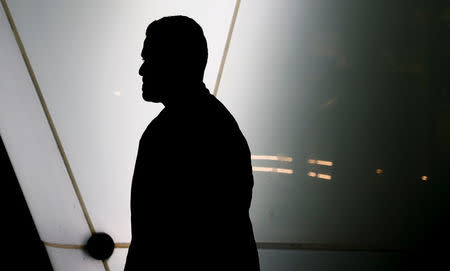 Basel, a 24 year-old migrant from Deraa in Syria, is silhouetted in a subway station in Vienna, Austria September 21, 2017. REUTERS/Leonhard Foeger