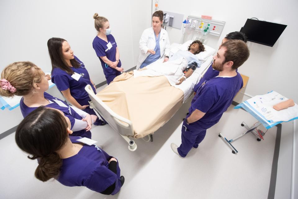 Nursing students and faculty demonstrate some of the capabilities of Curry College's new nursing simulation lab and training center at the school's Plymouth campus.