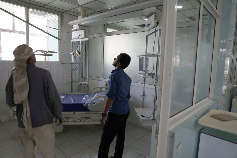 Workers inspect an intensive care room for renovation at a hospital allocated for coronavirus patients in preparation for any possible spread of the coronavirus disease (COVID-19), in Sanaa