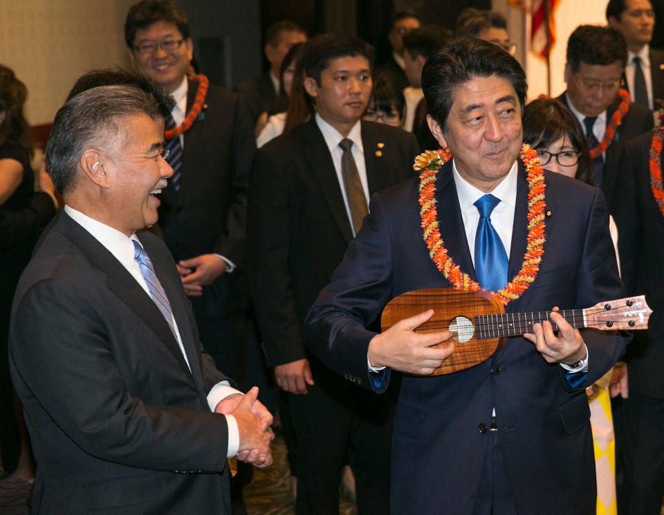 Japan’s Prime Minister Abe visits Pearl Harbor memorial on Hawaii trip