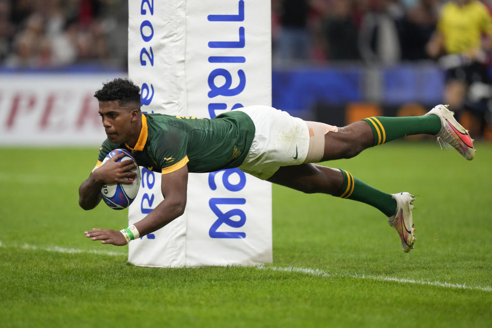 South Africa's Canan Moodie scores a try during the Rugby World Cup Pool B match between South Africa and Tonga, at Marseille's Stade Velodrome, France Sunday, Oct. 1, 2023. (AP Photo/Pavel Golovkin)