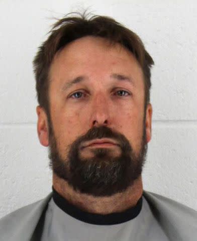 <p>Johnson County Sheriff's Office</p> The suspect, Matthew Lee Richards, 41, is charged with five counts of attempted murder and one count of aggravated arson with risk of bodily harm. The victims sustained laceration injuries of varying degrees. Credit: Johnson County Sheriff Office