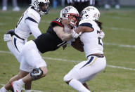 North Carolina State linebacker Payton Wilson (11) tackles Georgia Tech running back Jordan Mason for a loss during the first half of an NCAA college football game in Raleigh, N.C., Saturday, Dec. 5, 2020. (Ethan Hyman/The News & Observer via AP)