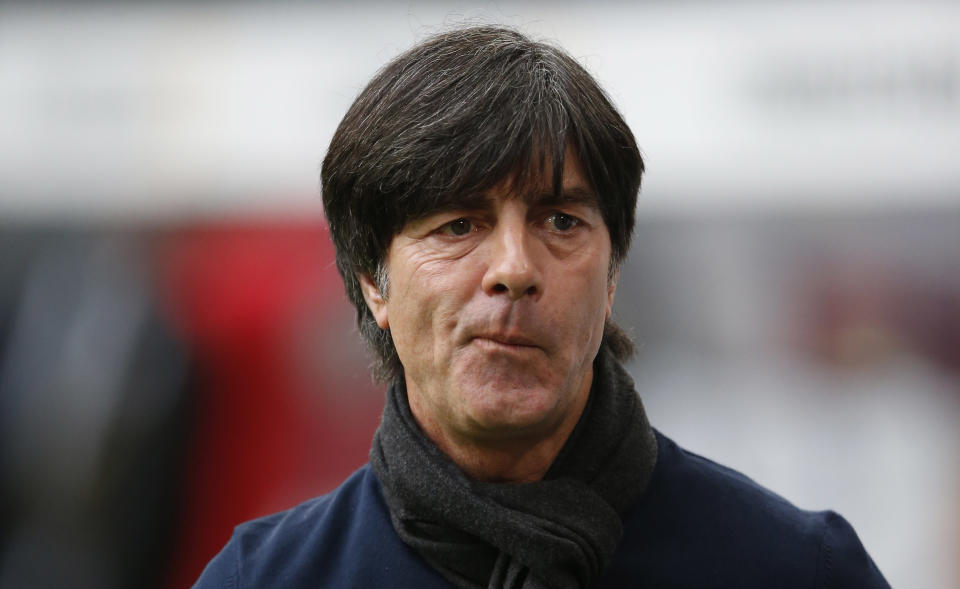 German head coach Joachim Loew arrives for a friendly soccer match between Germany and Poland in Hamburg, Germany, Tuesday, May 13, 2014. (AP Photo/Matthias Schrader)