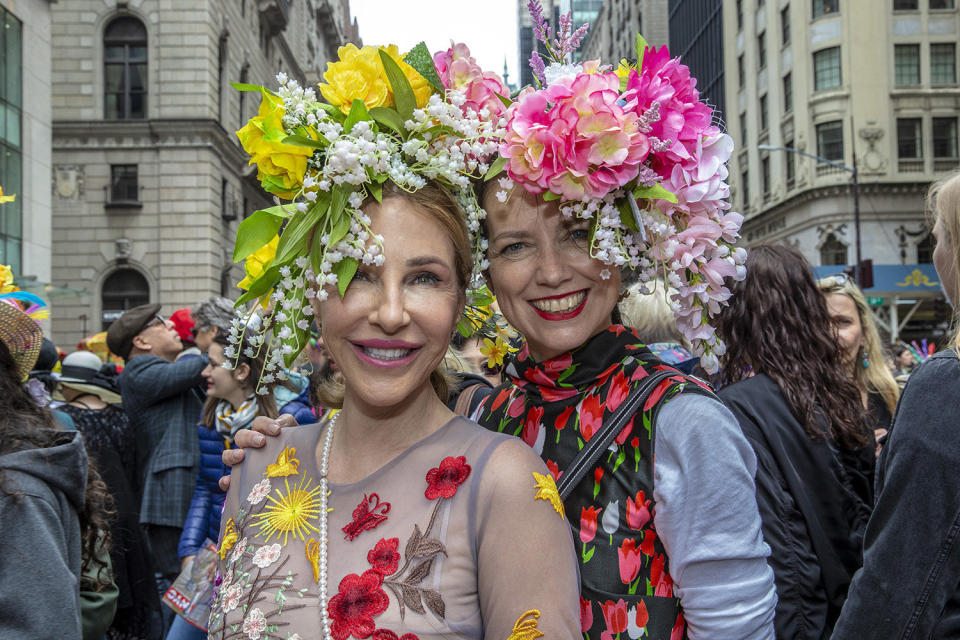 Kathryn and Gabrielle pose for a photo to show off their beautiful bonnets at the Easter Parade and Bonnet Festival, Sunday, April 21, 2019, in New York. (Photo: Gordon Donovan/Yahoo News)