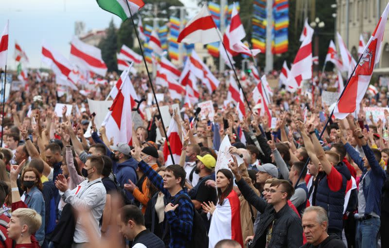 People attend an opposition rally to reject the presidential election results in Minsk