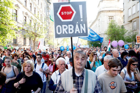 People attend a protest against the government of Prime Minister Viktor Orban in Budapest, Hungary, April 21, 2018. REUTERS/Bernadett Szabo