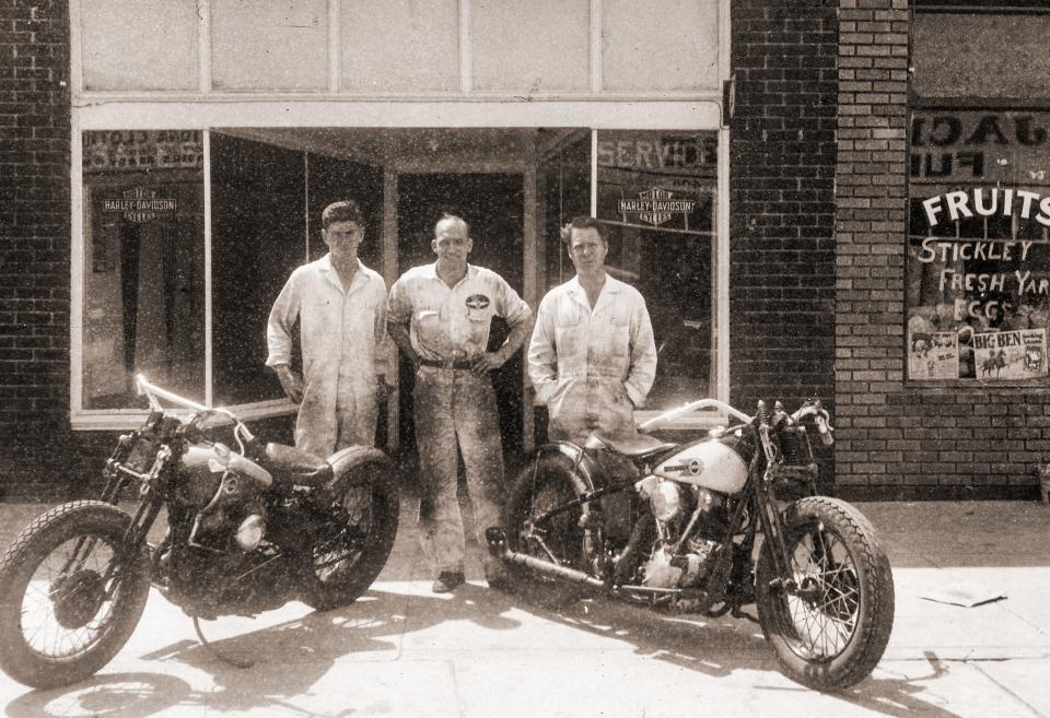 Lig Birch, left, and two mechanics in front of the Harley-Davidson motorcycle shop on Beach Street. &quot;The picture is most likely from 1939 to 1940,&quot; Langford wrote.