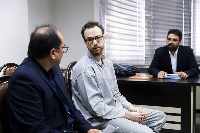 Johan Floderus sits at a courtroom at the Revolutionary Court in Tehran, Iran on Sunday December 10.