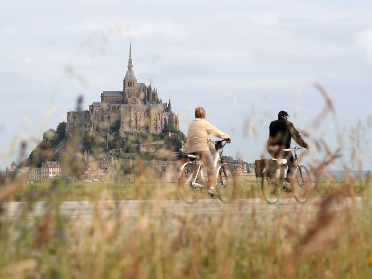 The gravity-defying abbey is worth a visit to Le Mont-Saint-Michel (Getty)