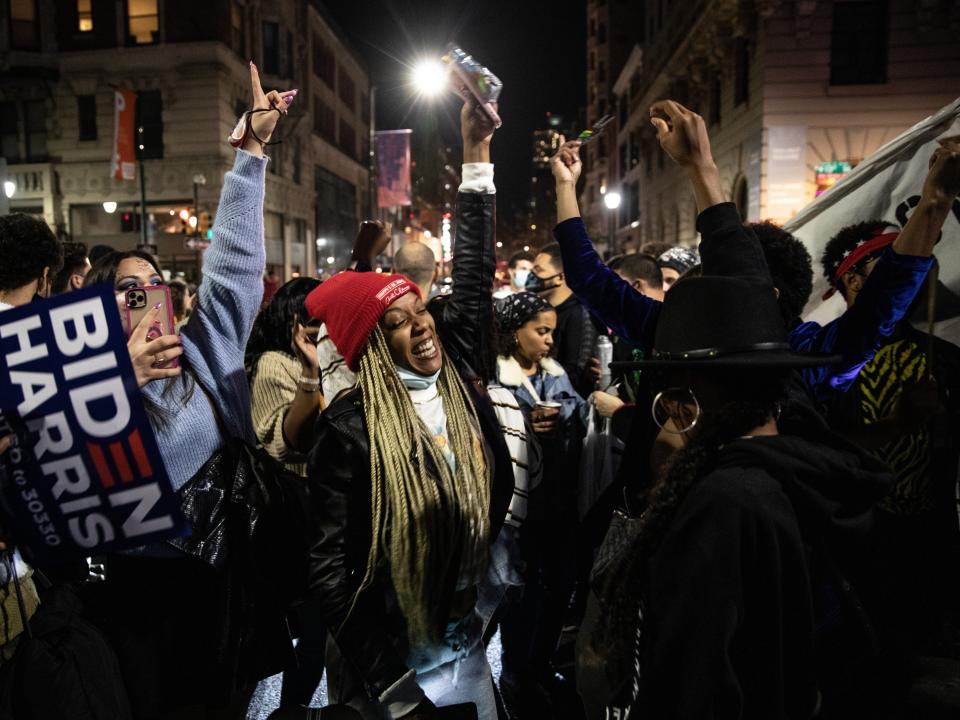 People dance in street after listening to President-elect Joe Biden address the nation on November 07, 2020.  (Getty Images)