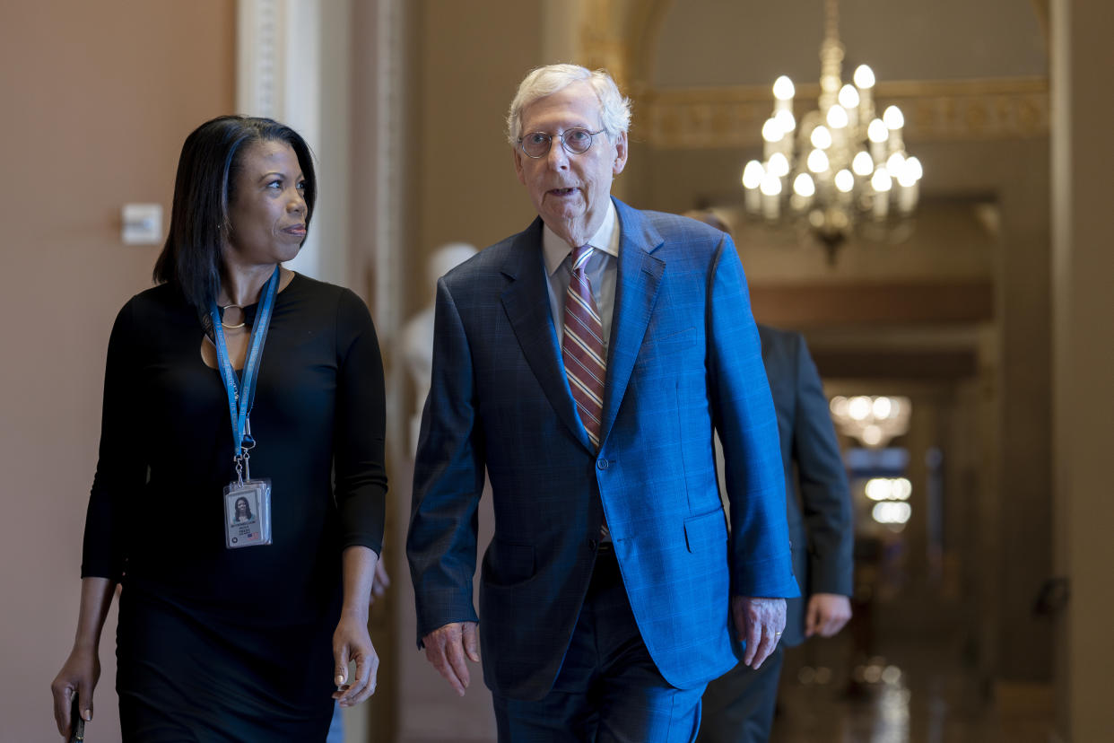 Days away from a default crisis, Senate Minority Leader Mitch McConnell, R-Ky., walks to the chamber as the Senate dashes to wrap up work on the big debt ceiling and budget cuts package, at the Capitol in Washington, Thursday, June 1, 2023. (AP Photo/J. Scott Applewhite)