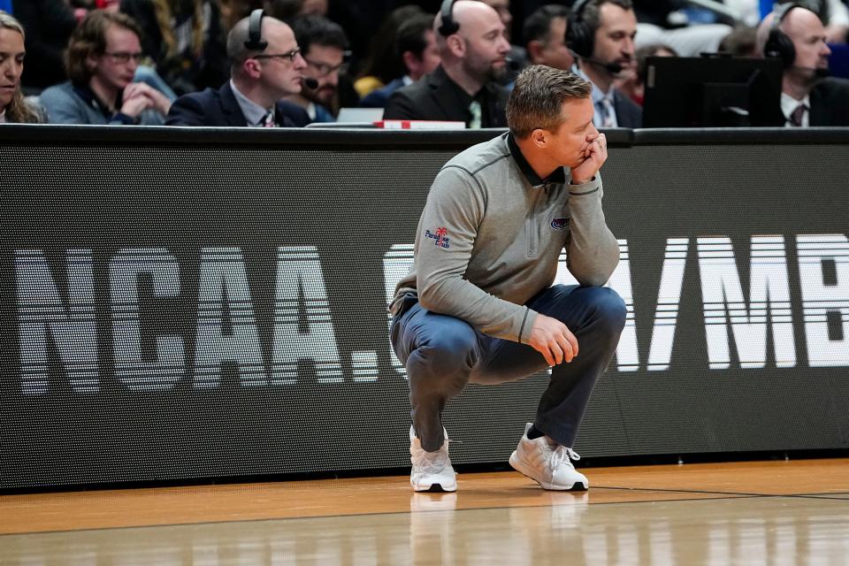 Mar 17, 2023; Columbus, Ohio, USA;  Florida Atlantic Owls head coach Dusty May watches his team during the first round of the NCAA men’s basketball tournament against the Memphis Tigers at Nationwide Arena. Mandatory Credit: Adam Cairns-The Columbus Dispatch