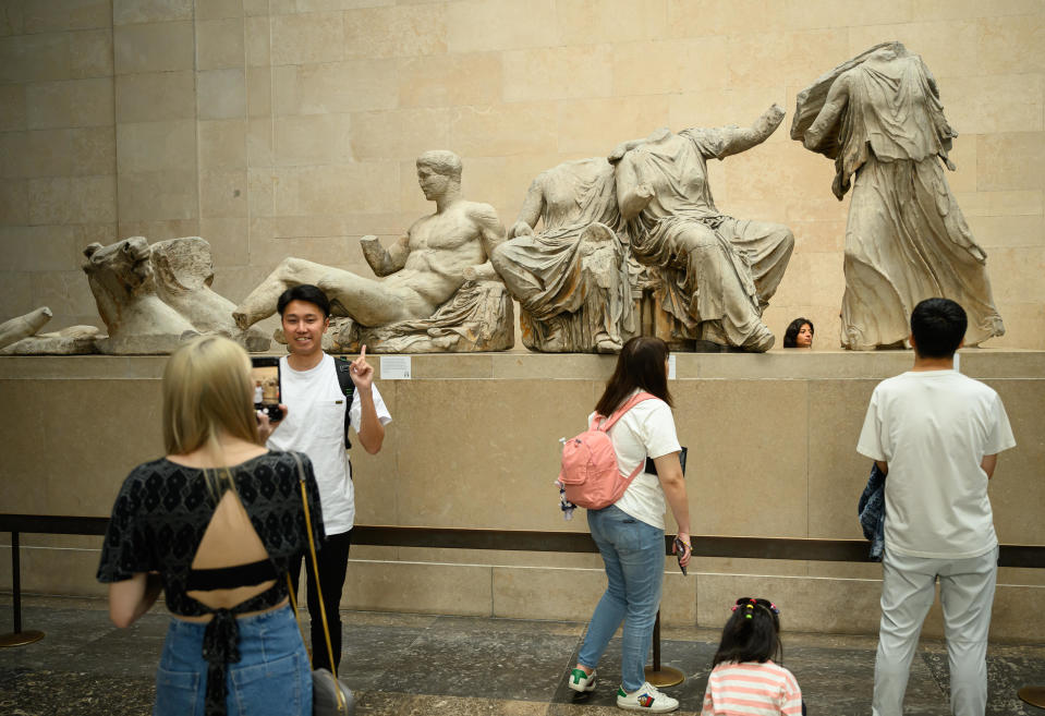 Visitors to the British Museum in London, England, walk around a selection of items from the collection of ancient Greek sculptures known as The Elgin Marbles, Aug. 23, 2023. / Credit: LEON NEAL/Getty