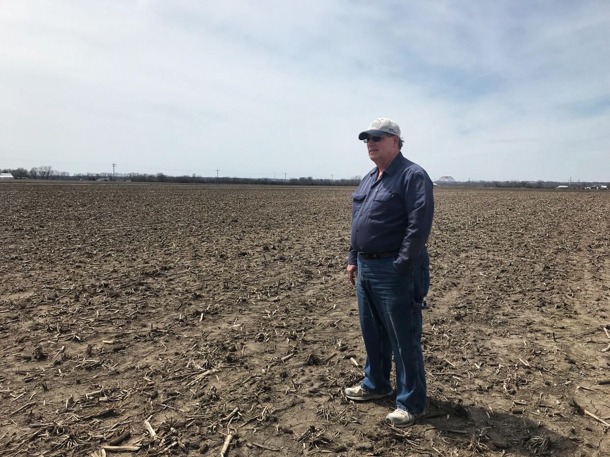 Daryl Cates, a corn and soybean farmer, stands on his soon-to-be planted field in Columbia, Ill. (Photo: Holly Bailey/Yahoo News)