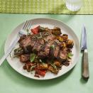 <p>A steak dinner doesn't always have to be heavy. This light option is served with a vegetable medley of peppers and eggplant. </p><p><em><a href="https://www.womansday.com/food-recipes/food-drinks/a28354436/balsamic-steak-with-eggplant-and-peppers-recipe/" rel="nofollow noopener" target="_blank" data-ylk="slk:Get the Balsamic Steak with Eggplant and Peppers recipe.;elm:context_link;itc:0;sec:content-canvas" class="link ">Get the Balsamic Steak with Eggplant and Peppers recipe. </a></em></p>