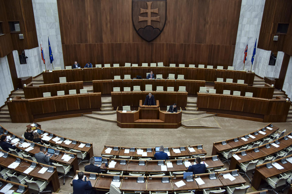 A general view during a Parliamentary session in Bratislava, Slovakia, Friday, Nov. 29, 2019. Lawmakers in Slovakia are scheduled to debate a proposed law that would compel women seeking an abortion to first have an ultrasound and listen to the heartbeat of the embryo or fetus, a move many groups have decried as a backward step for women’s rights. The bill was submitted by three members of the conservative Slovak National Party, who wrote that it is intended “to ensure that women are informed about the current stage of their pregnancy” before having an abortion. (Pavol Zachar/TASR via AP)