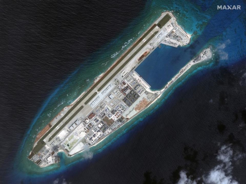 This March 2017 image provided by Maxar Technologies shows a satellite image of the Chinese-occupied Fiery Cross Reef in Spratly island chain in the South China Sea, one of several disputed islands, reefs or shoals in the area.