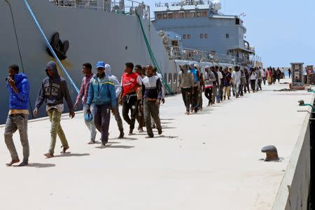 Migrants arrive at a naval base after being rescued by Libyan coast guards in Tripoli, Libya June 29, 2018. REUTERS/Ismail Zitouny