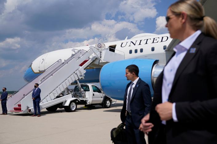 Secret Service personnel guard Air Force Two after a technical issue forced the aircraft to return and land with Vice President Kamala Harris onboard at Andrews Air Force Base, Maryland, on June 6, 2021.