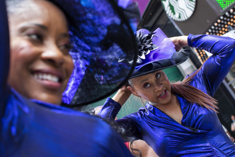 Women wait to perform during a free outdoor event organized by The Broadway League during Juneteenth celebrations at Times Square on Saturday, June 19, 2021. (AP Photos)