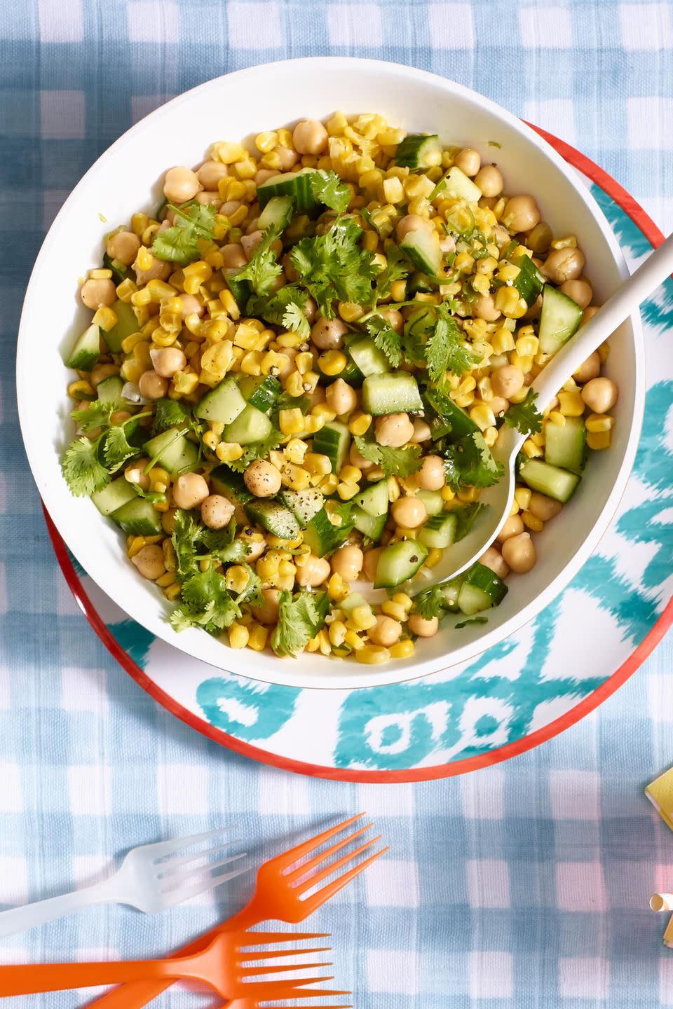 <p>Move over, lettuce: Combine some of the best flavors of summer in this hearty bowl. </p><p><a href="https://www.womansday.com/food-recipes/food-drinks/recipes/a55342/fresh-corn-and-chickpea-salad-recipe/" rel="nofollow noopener" target="_blank" data-ylk="slk:Get the recipe for Fresh Corn and Chickpea Salad.;elm:context_link;itc:0;sec:content-canvas" class="link "><em>Get the recipe for Fresh Corn and Chickpea Salad.</em></a> </p>