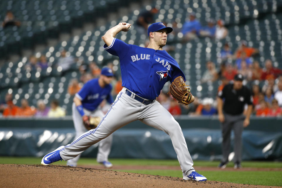 Toronto Blue Jays starting pitcher Sam Gaviglio throws to the Baltimore Orioles in the first inning of a baseball game, Monday, Aug. 27, 2018, in Baltimore. (AP Photo/Patrick Semansky)