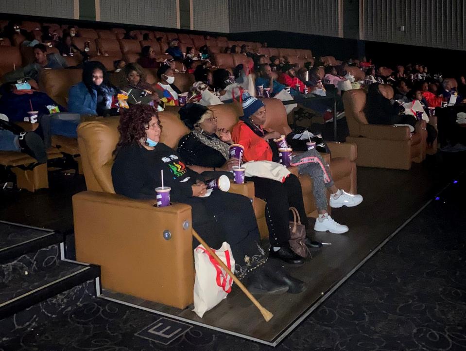 People sitting inside theater No. 11 of the Emagine Royal Oak theater watching the movie "King Richard" on Nov 20, 2021.