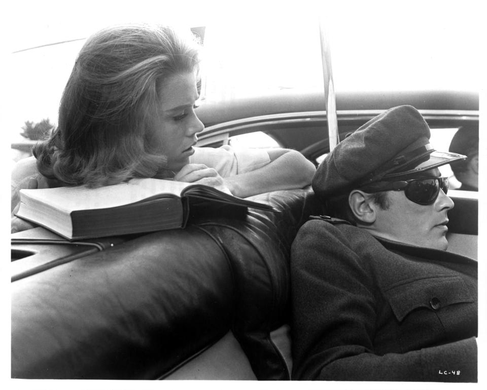 Jane Fonda stares at Alain Delon in a scene from the film 'Joy House', 1964. (Photo by Metro-Goldwyn-Mayer/Getty Images)