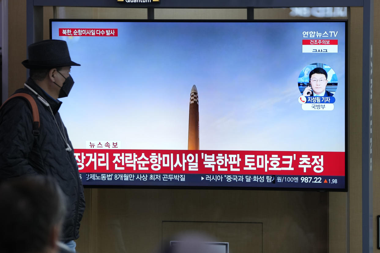 A TV screen is seen reporting North Korea's missile launch during a news program at the Seoul Railway Station in Seoul, South Korea, Wednesday, March 22, 2023. North Korea launched multiple cruise missiles toward the sea on Wednesday, South Korea's military said, three days after the North carried out what it called a simulated nuclear attack on South Korea. The letters read "North, launched multiple cruise missiles." (AP Photo/Lee Jin-man)