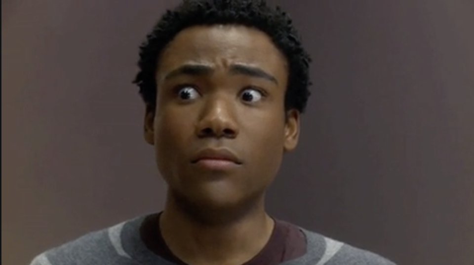 Donald Glover looking around nervously