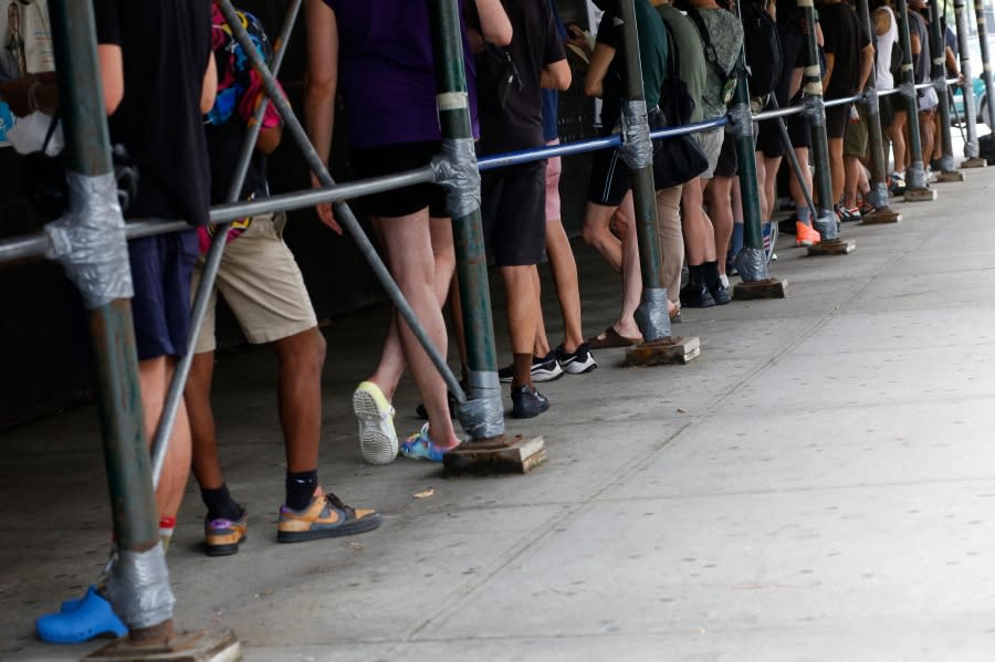 This line in New York City is one of many long lines of people waiting to receive the monkeypox vaccine. (Photo by Kena Betancur / AFP) (Photo by KENA BETANCUR/AFP via Getty Images)