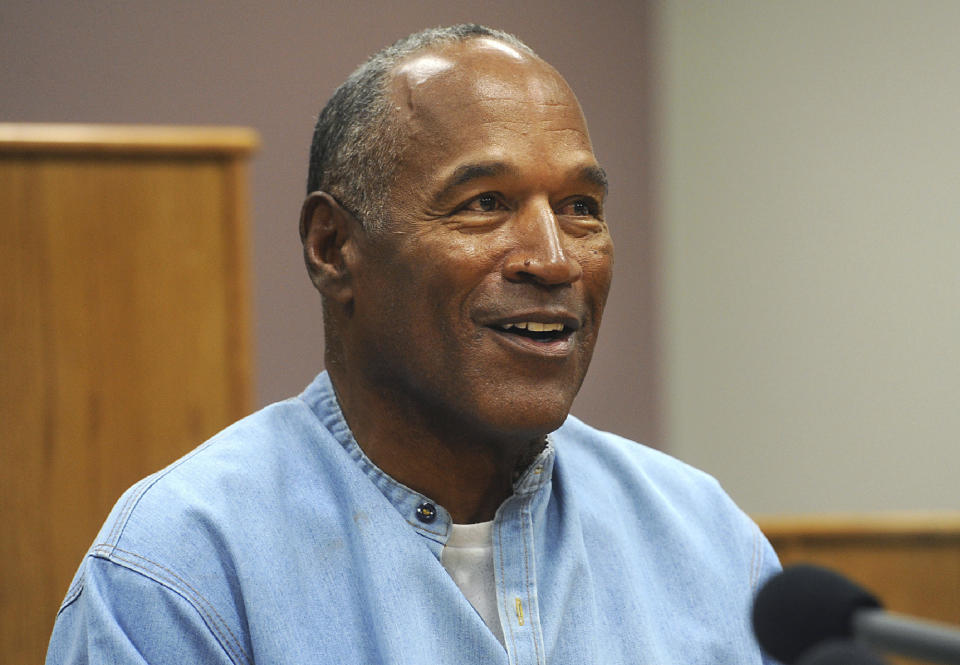 FILE - Former NFL football star O.J. Simpson appears via video for his parole hearing at the Lovelock Correctional Center in Lovelock, Nev., on July 20, 2017. Simpson, the decorated football superstar and Hollywood actor who was acquitted of charges he killed his former wife and her friend but later found liable in a separate civil trial, has died. He was 76. (Jason Bean/The Reno Gazette-Journal via AP, Pool, File)