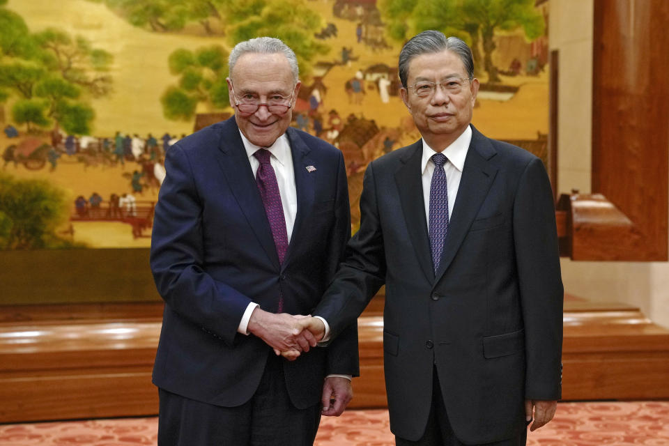 Visiting U.S. Senate Majority Leader Chuck Schumer, D-N.Y., left, and Zhao Leji, chairman of China's National People's Congress pose for a photograph before their bilateral meeting at the Great Hall of the People in Beijing, Monday, Oct. 9, 2023. (AP Photo/Andy Wong, Pool)
