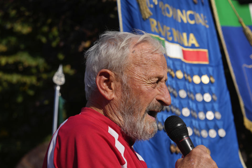 Italian writer Adelmo Cervi delivers his speech during a march organized by the Italian Partisans association in Mussolini's birthplace Predappio Friday, Oct. 28, 2022, to mark the 78th anniversary of the liberation of the town from the nazi-fascist occupation by Italian Partisans and Polish allied troops, which coincides with the 100th anniversary of the march on Rome. (AP Photo/Luca Bruno)