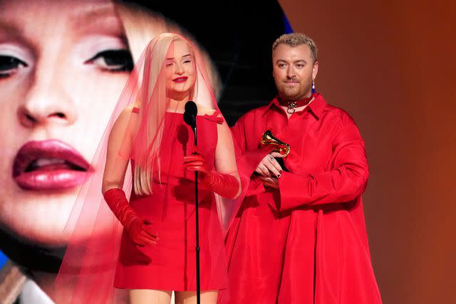 <p>Kevin Mazur/Getty</p> Sam Smith and Kim Petras accept their Grammy Awards