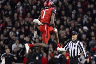 Cincinnati cornerback Ahmad Gardner (1) reacts after sacking Houston quarterback Clayton Tune during the first half of the American Athletic Conference championship NCAA college football game Saturday, Dec. 4, 2021, in Cincinnati. (AP Photo/Jeff Dean)