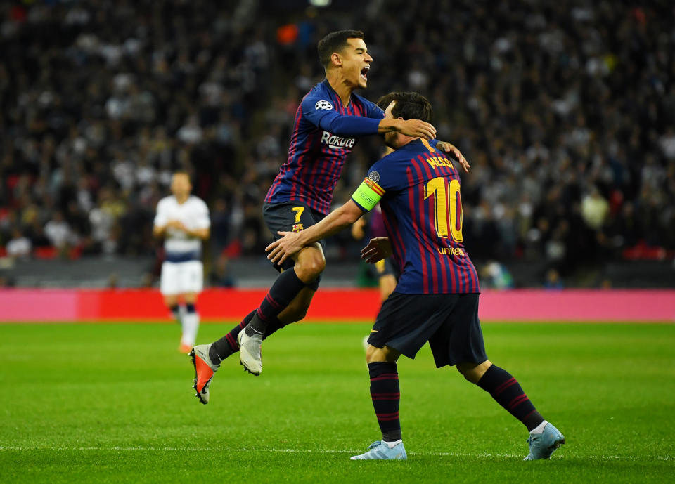 Philippe Coutinho (left) celebrates his early goal with Barcelona teammate Lionel Messi (REUTERS/Dylan Martinez)