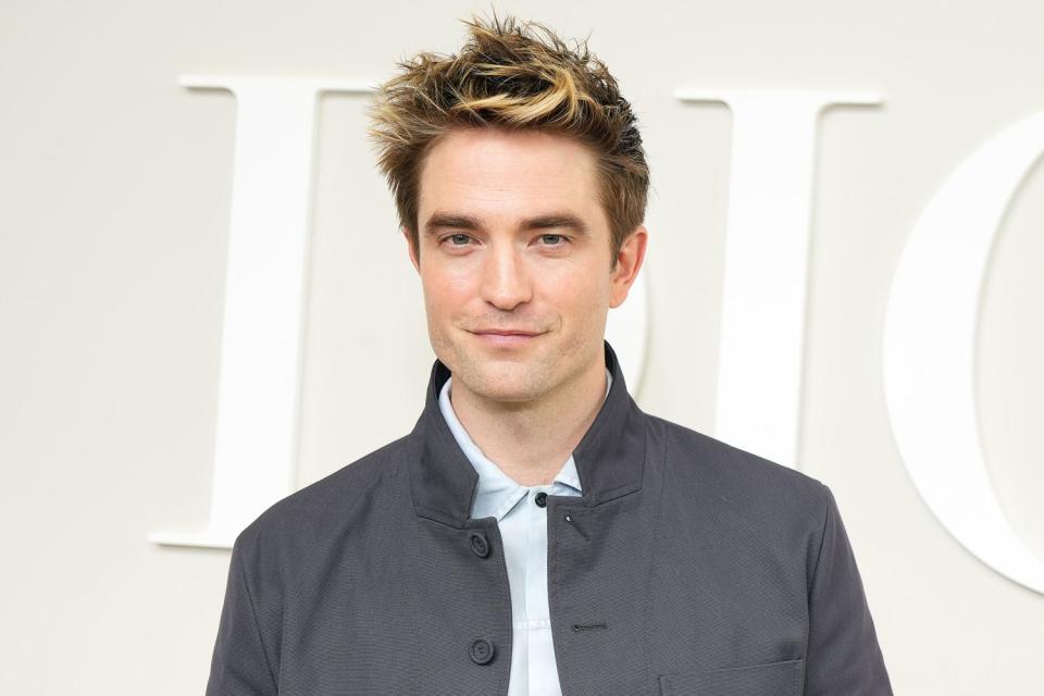 <p>Francois Durand/Getty</p>  Robert Pattinson attends the Dior Homme Menswear Spring/Summer 2025 show 