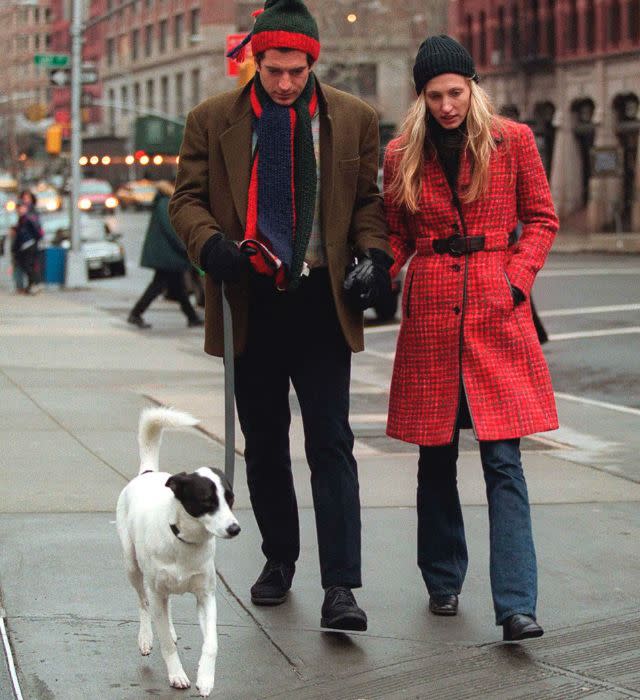 292061 08: (MAGAZINES PLEASE CALL) John F. Kennedy Jr. and his wife Carolyn walk with their dog January 1, 1997 in New York City. July 16, 2000 marks the one-year anniversary of the plane crash off the coast of Martha’s Vineyard in Massachusetts that killed John F. Kennedy Jr., 38, his wife Carolyn Bessette Kennedy, 33, and her sister Lauren Bessette, 34. (Photo by Evan Agostini/Liaison)