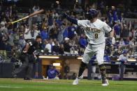 Milwaukee Brewers' Manny Pina reacts after hitting a home run during the eighth inning of a baseball game against the Chicago Cubs Saturday, Sept. 18, 2021, in Milwaukee. (AP Photo/Morry Gash)