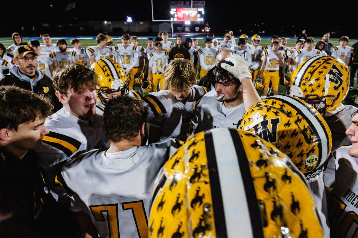 West Jefferson reacts to its 42-7 loss to Sugarcreek Garaway in the Division VI, Region 23 final Friday at Zanesville.