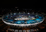 LONDON, ENGLAND - JULY 27: A helicopter flies above the olympic stadium as Team Great Britain walks in during the Opening Ceremony for the 2012 Olympic Games on July 27, 2012 at Olympic Park in London, England. (Photo by Jamie Squire/Getty Images)