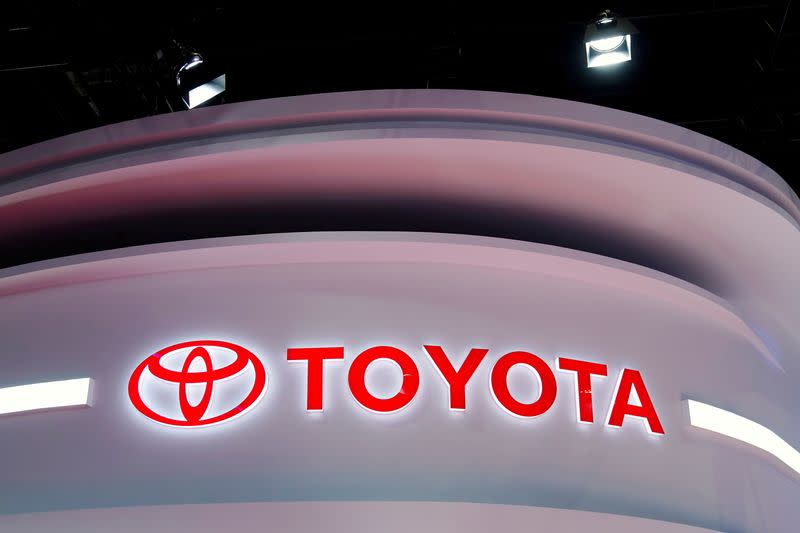 FILE PHOTO: The Toyota logo is seen at a booth during a media day for the Auto Shanghai show