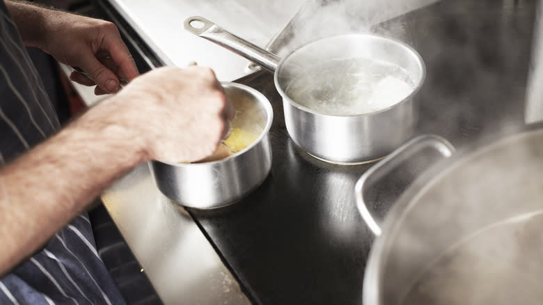 stirring pasta